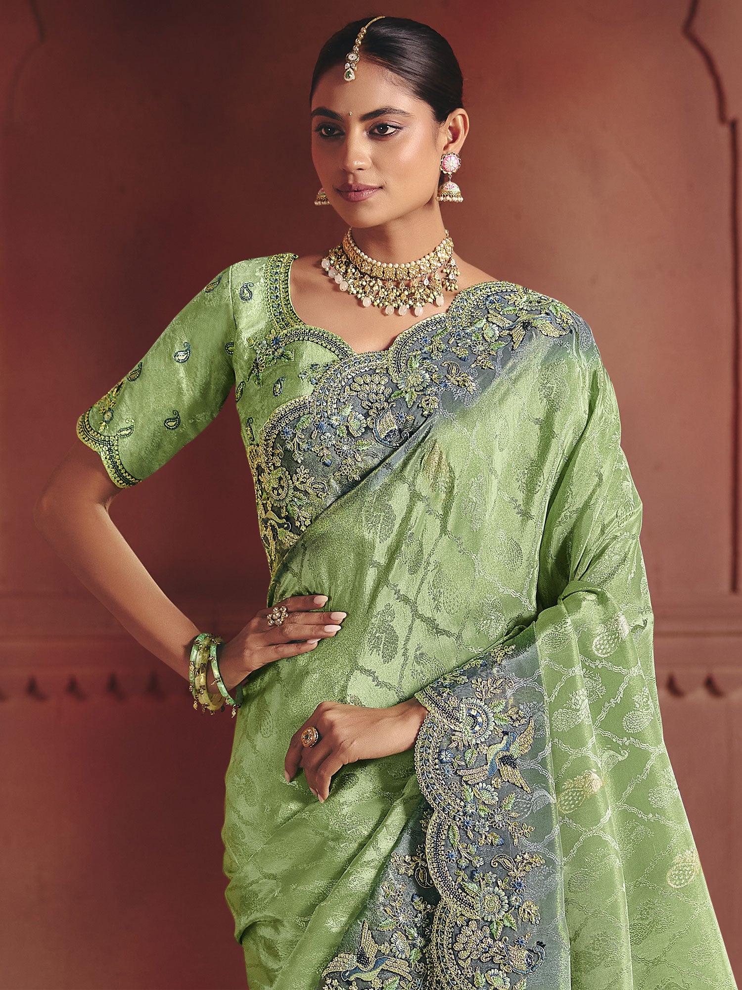 Green Party Wear Saree In Heavy Thread Work