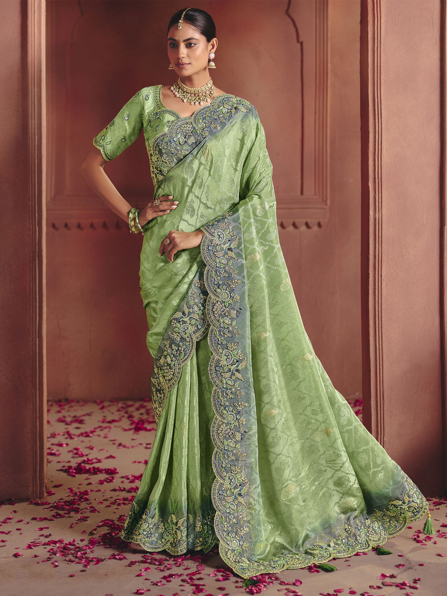 Green Party Wear Saree In Heavy Thread Work