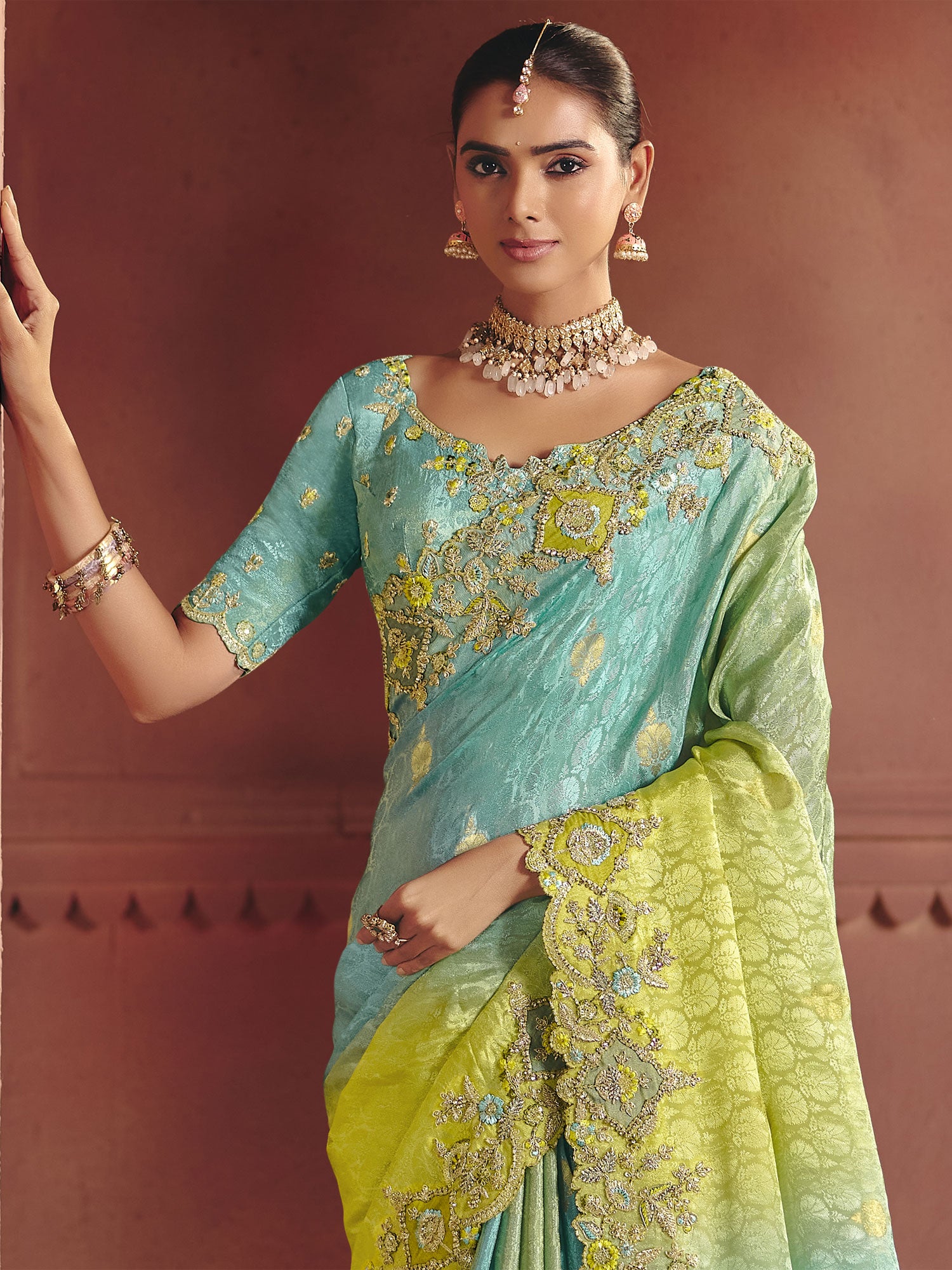 Turquoise And Blue Shaded Saree With Heavy Borders