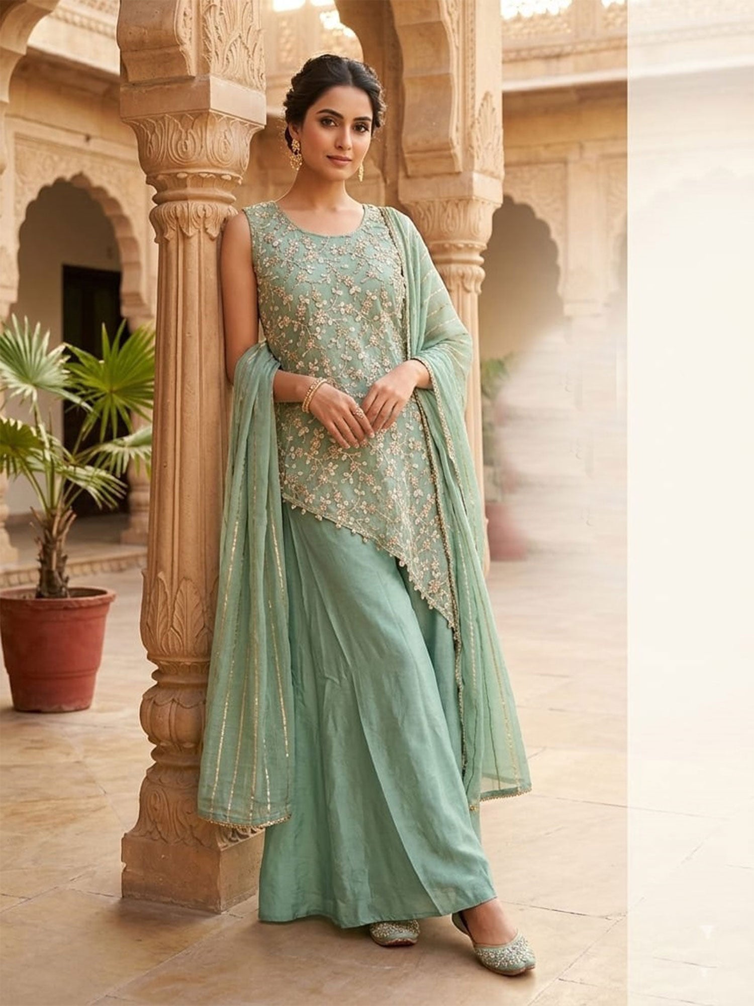 Sea Green Silk Salwar Kameez In Heavy Embroidery