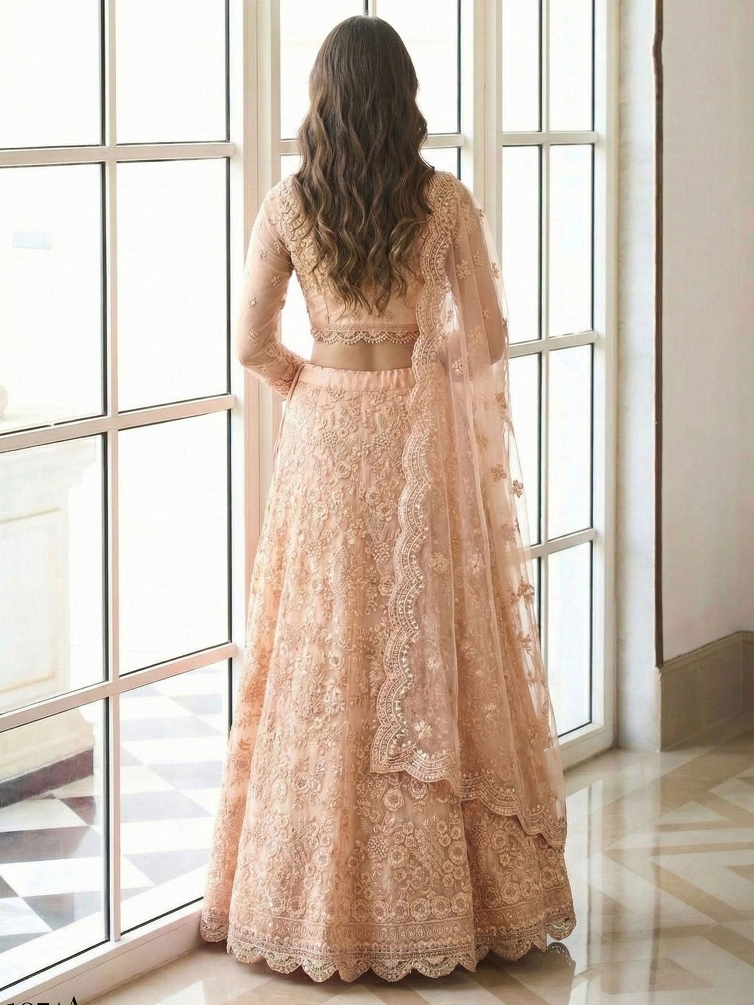 Light Peach Party Wear Net Lehenga Choli