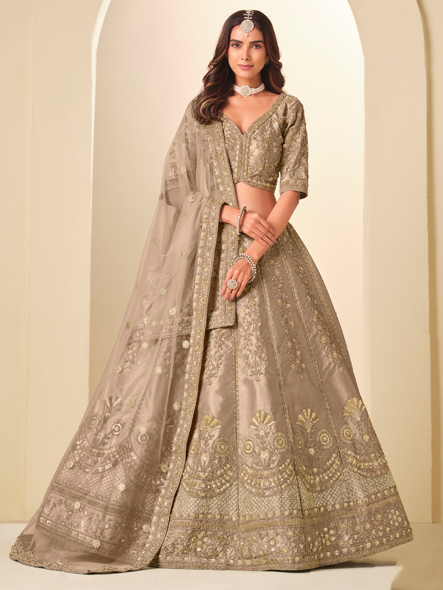 Beige Silk Lehenga Choli With Net Dupatta