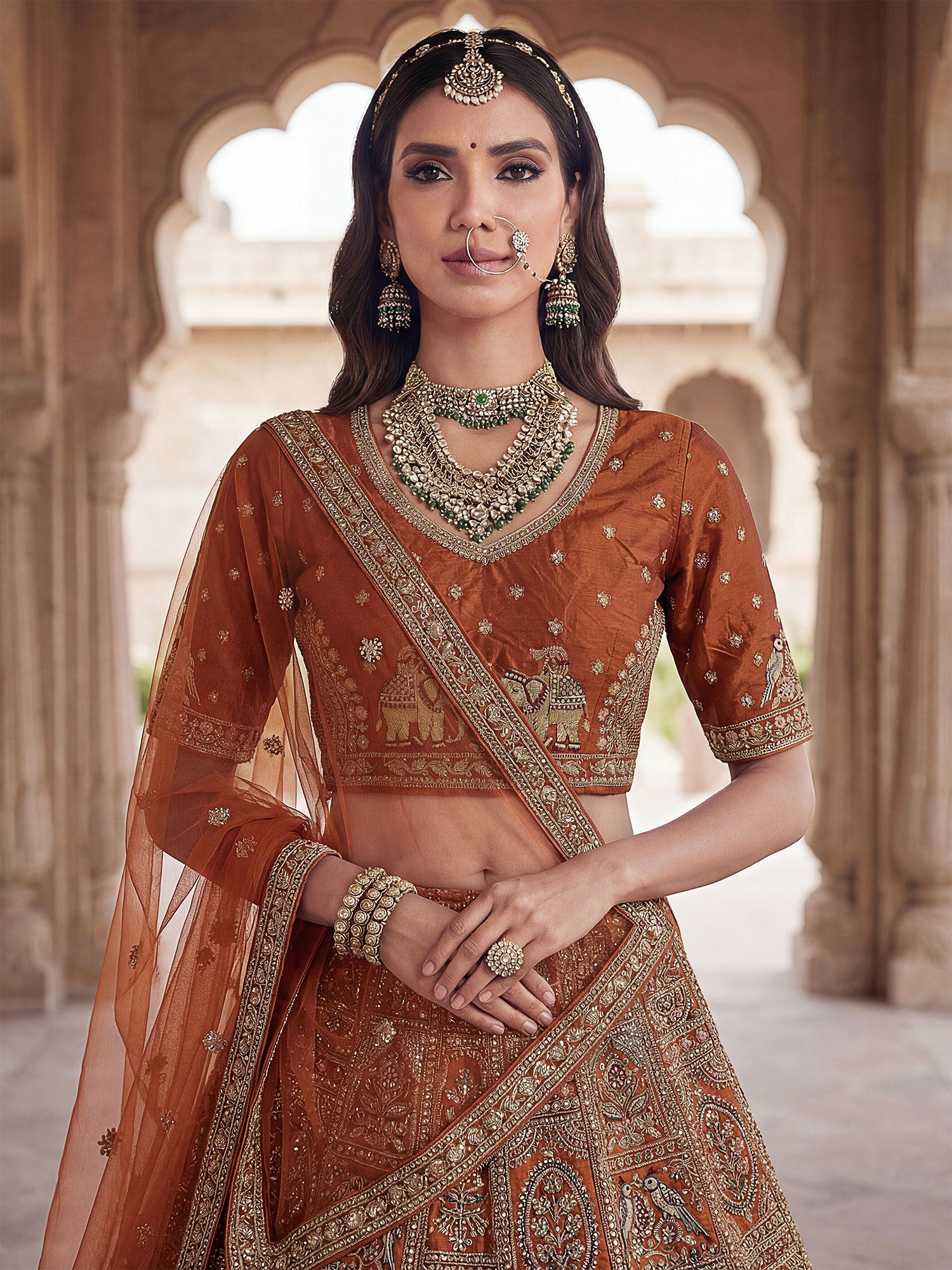 Rust Heavy Embroidered Traditional Lehenga Choli