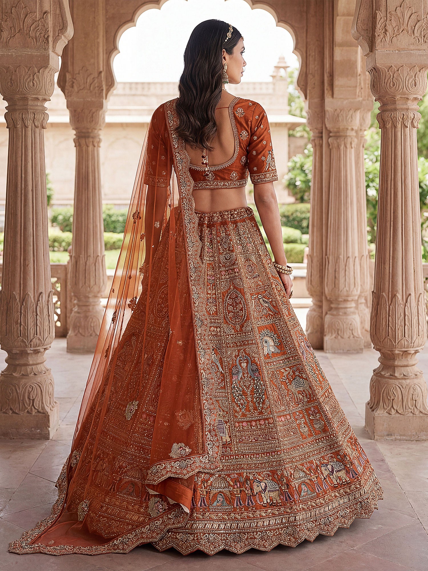 Rust Heavy Embroidered Traditional Lehenga Choli