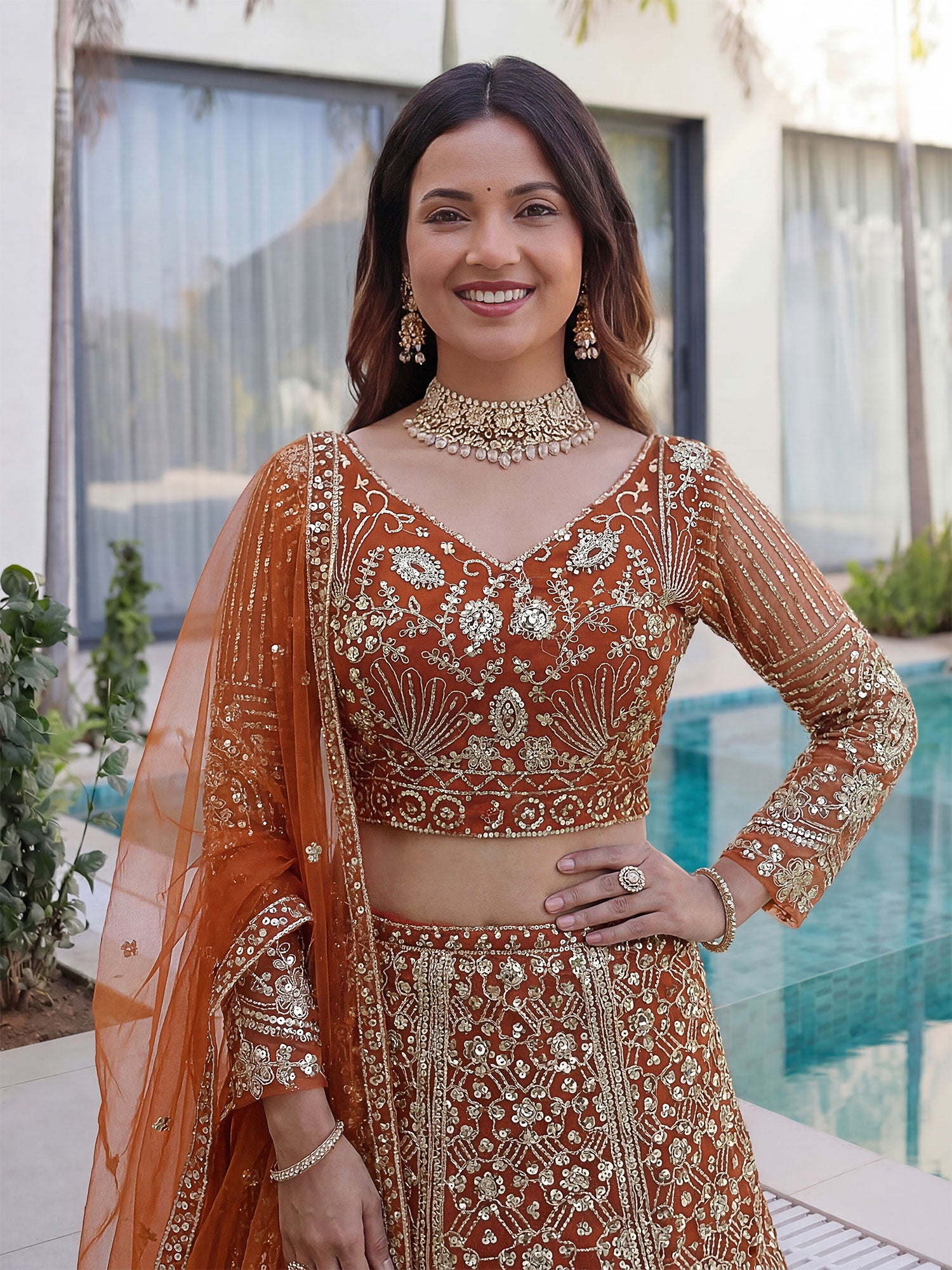 Orange Sequins Work Augmented Lehenga Choli