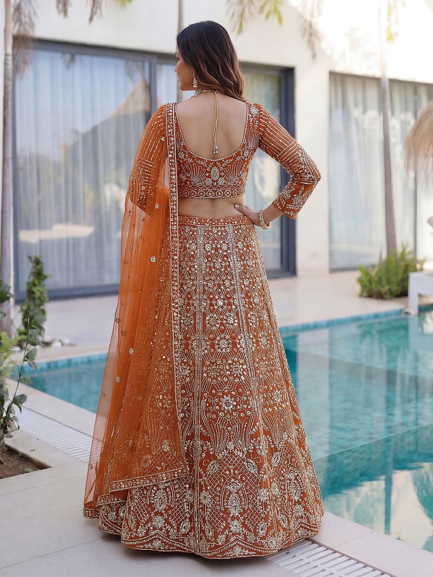 Orange Sequins Work Augmented Lehenga Choli