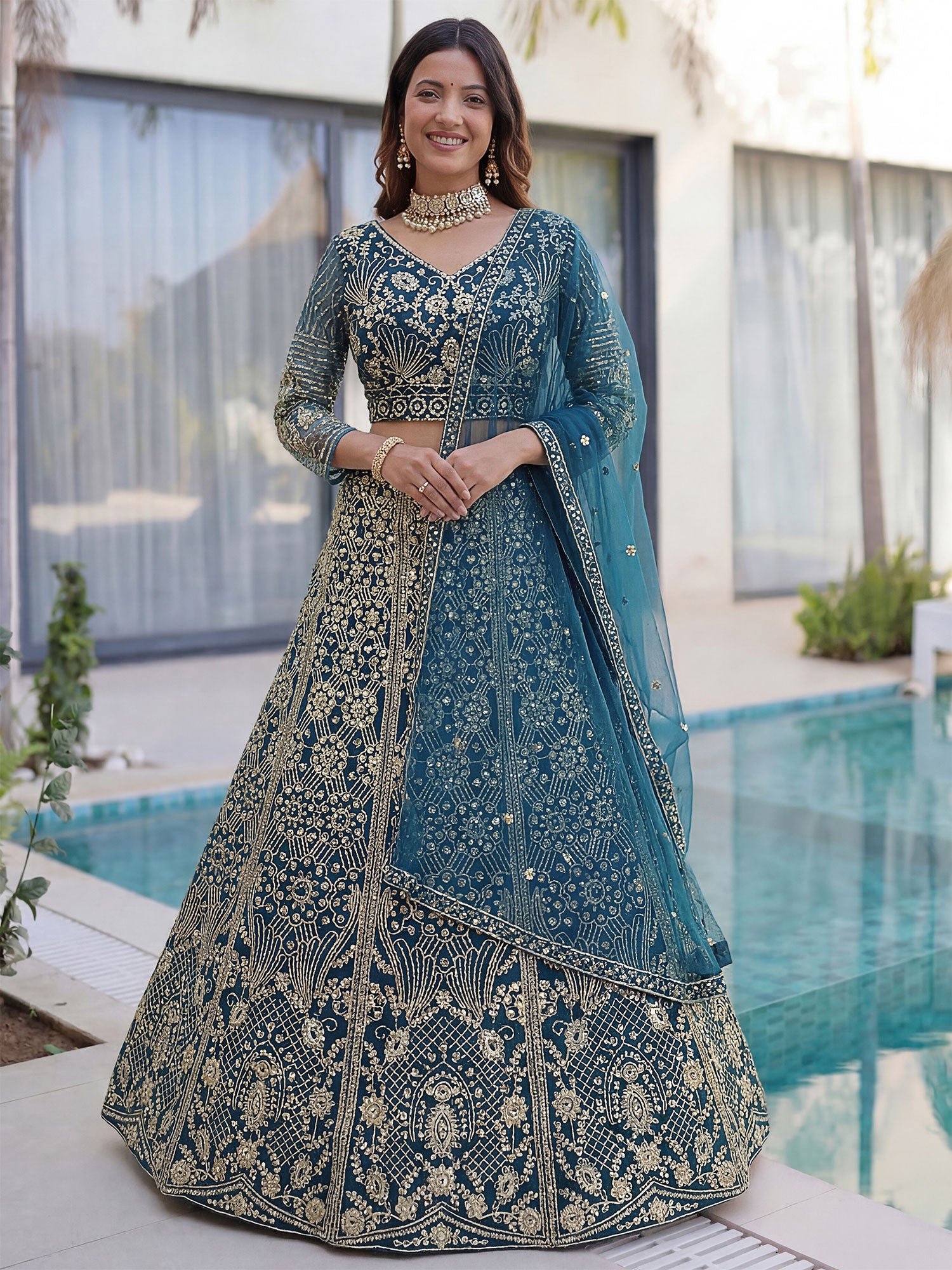 Blue Net Lehenga Choli In Zari Embellishment