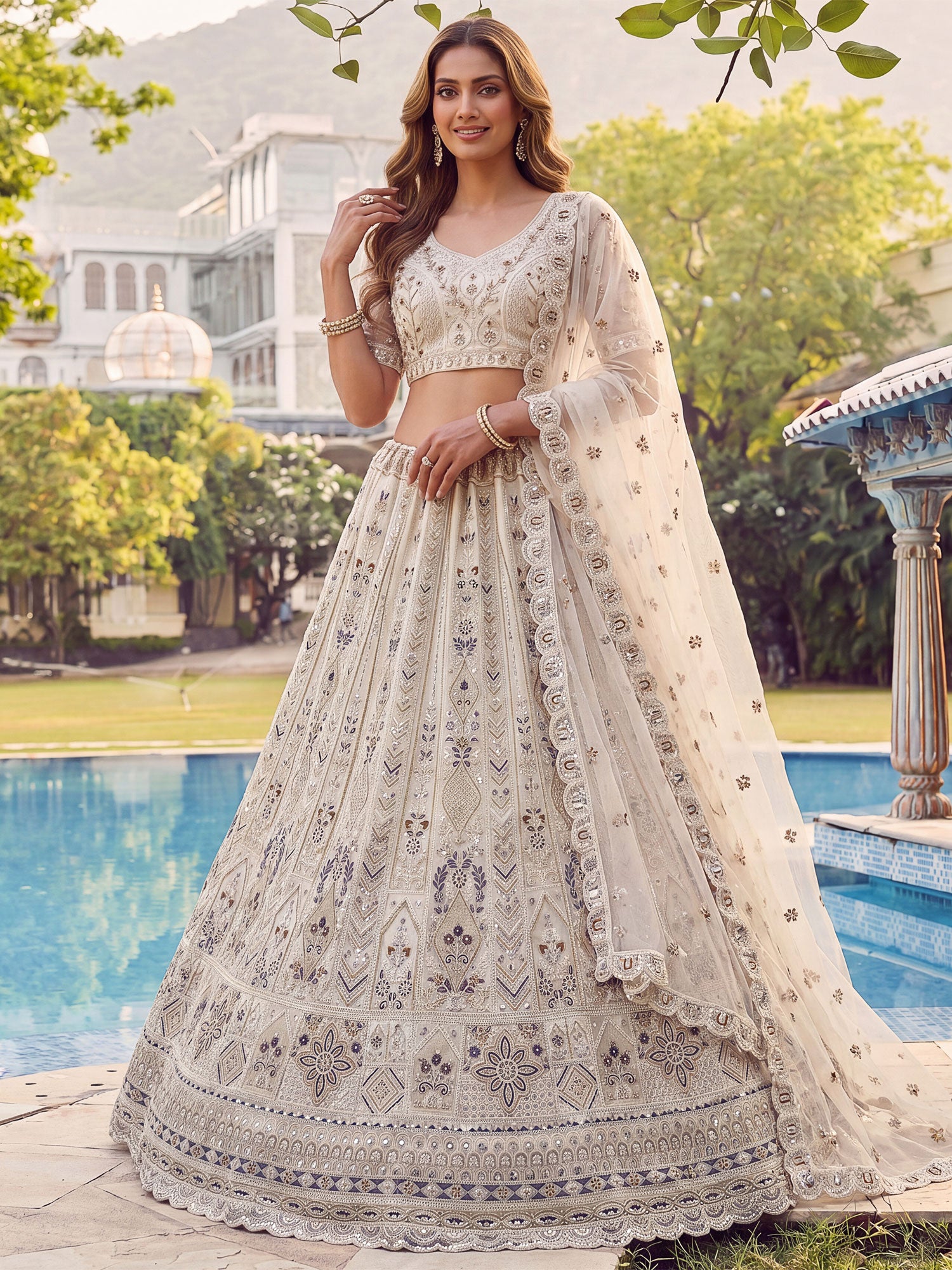 Off White Embroidered Net Lehenga Choli