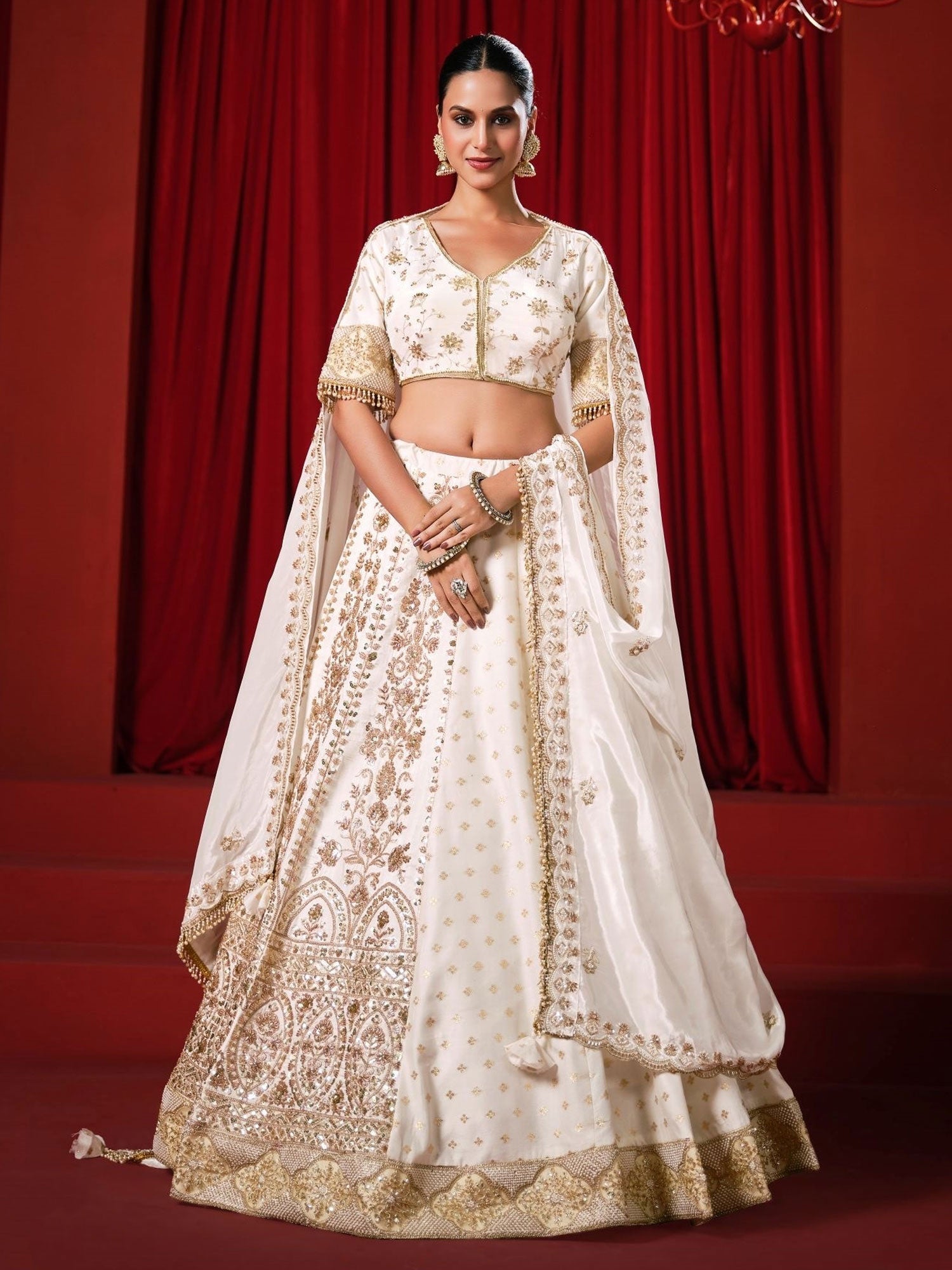 White Crepe Lehenga Set With Zari Embellishment