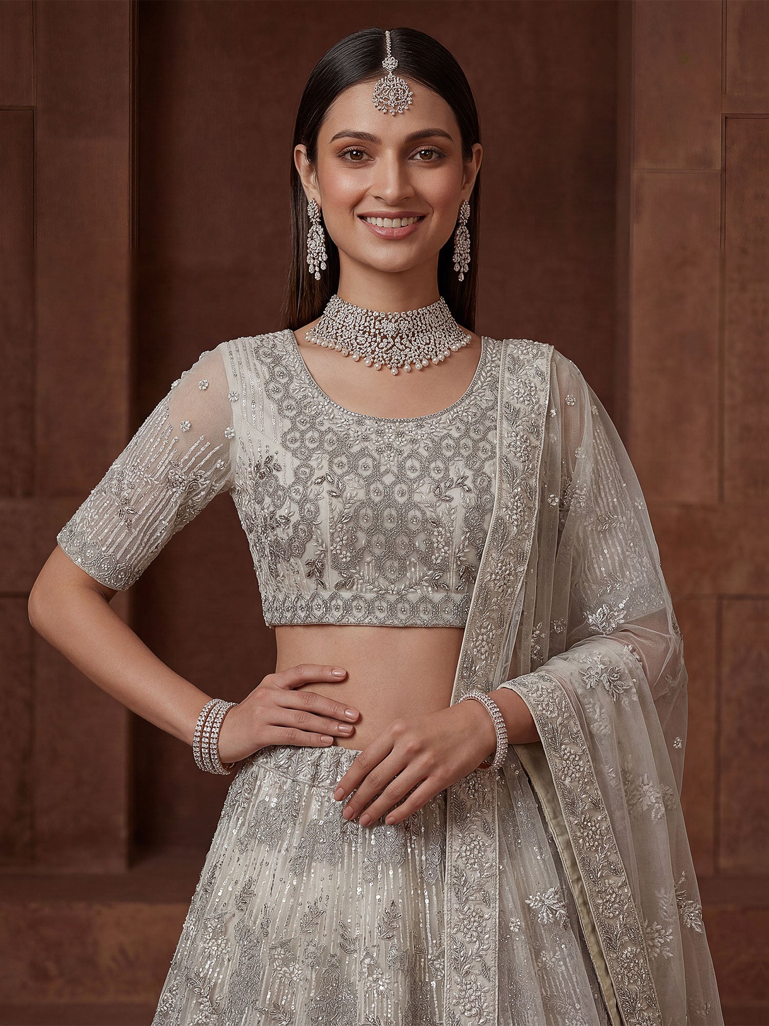 Off White Embroidered Bridesmaid Net Lehenga Set