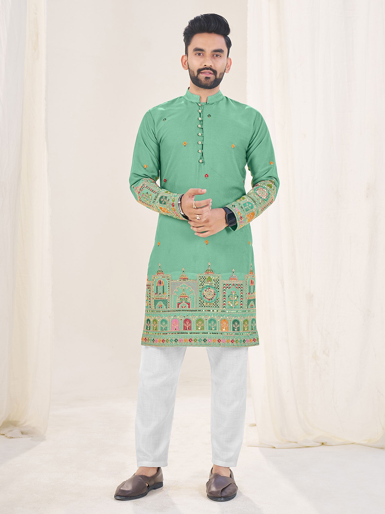 Turquoise Sequins Augmented Kurta Set In Georgette