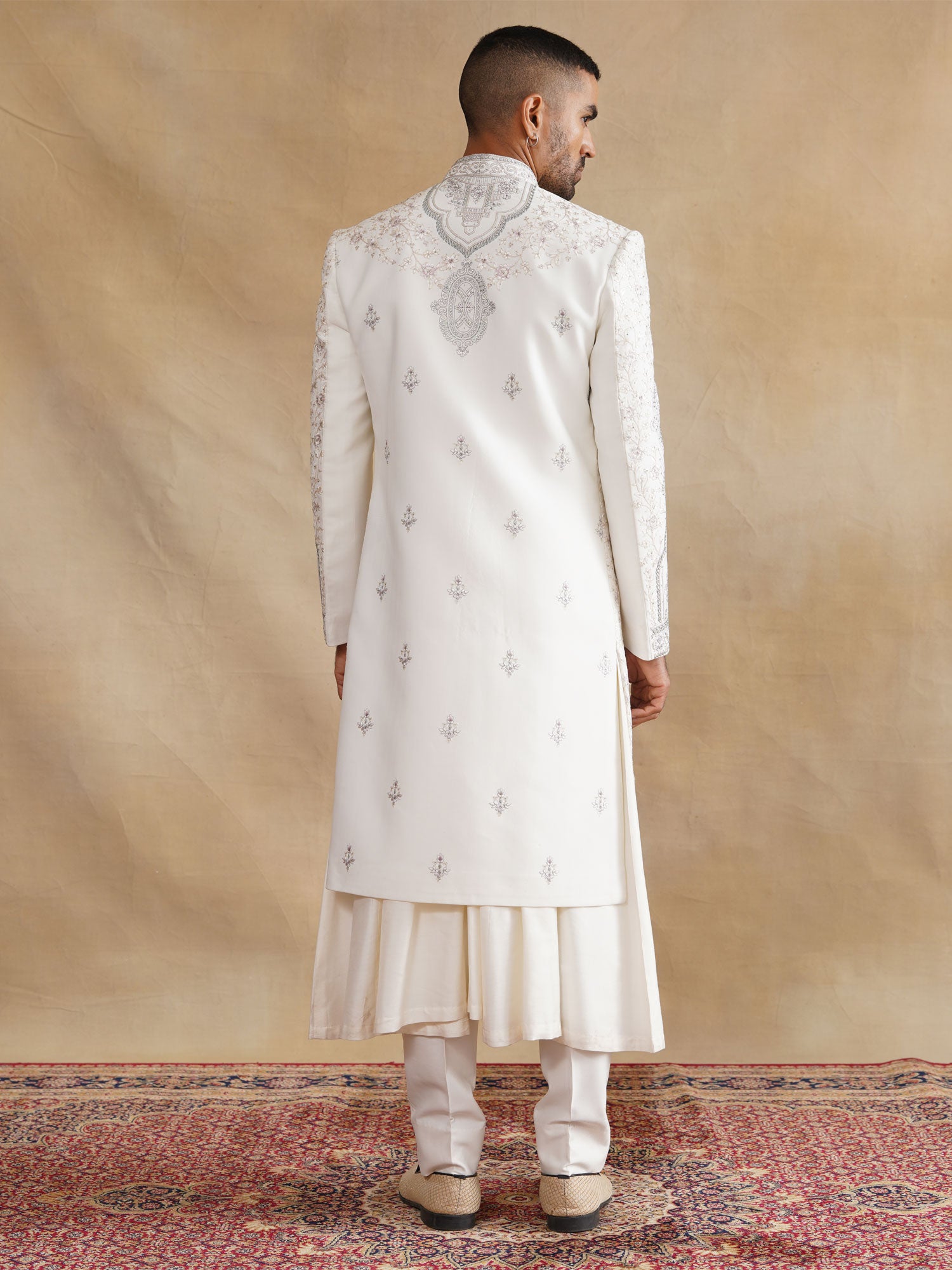 White Groom's Sherwani With Kurta In Anarkali Style