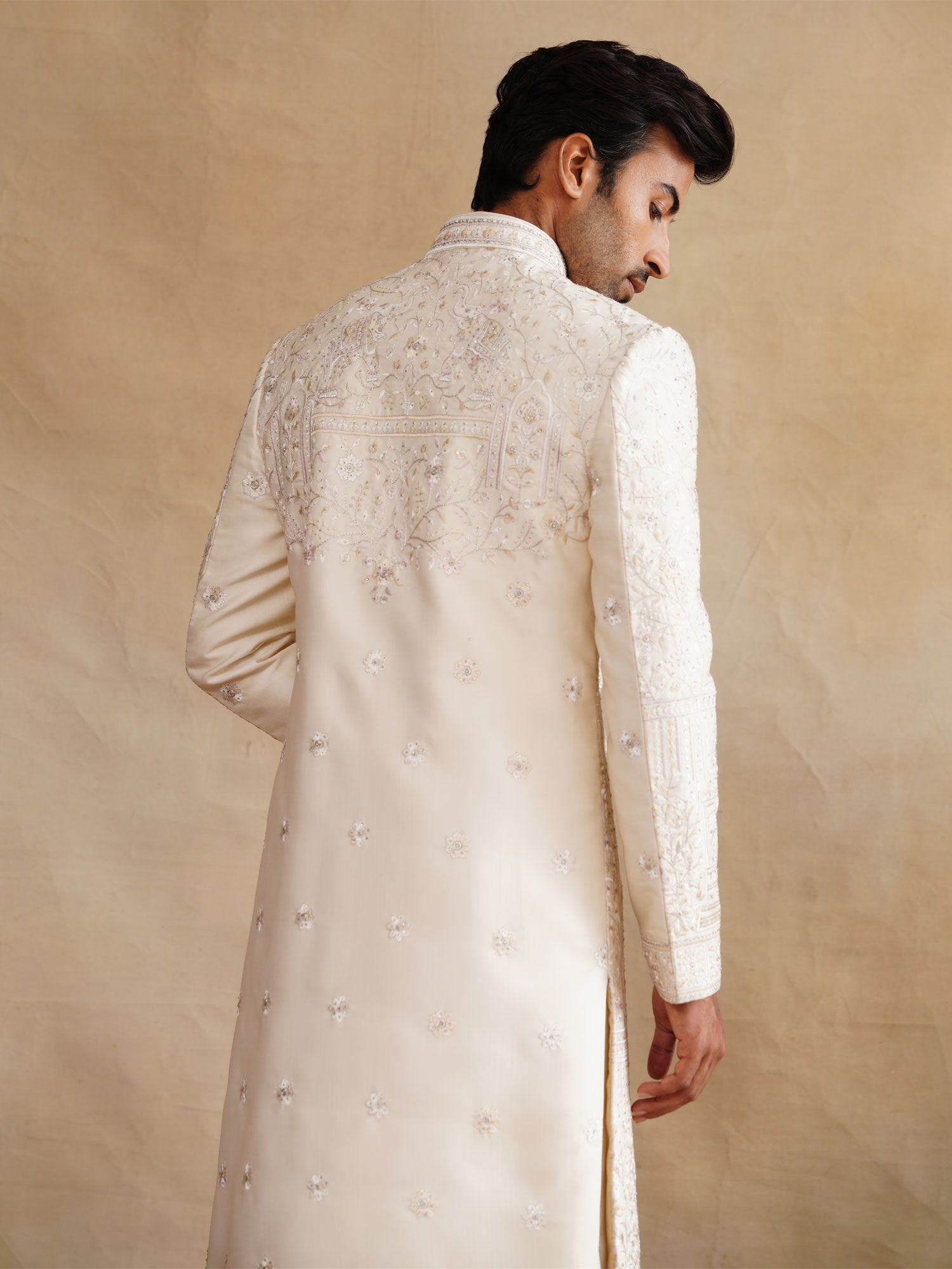 Cream Anarkali Style Sherwani In Stone Embellishment