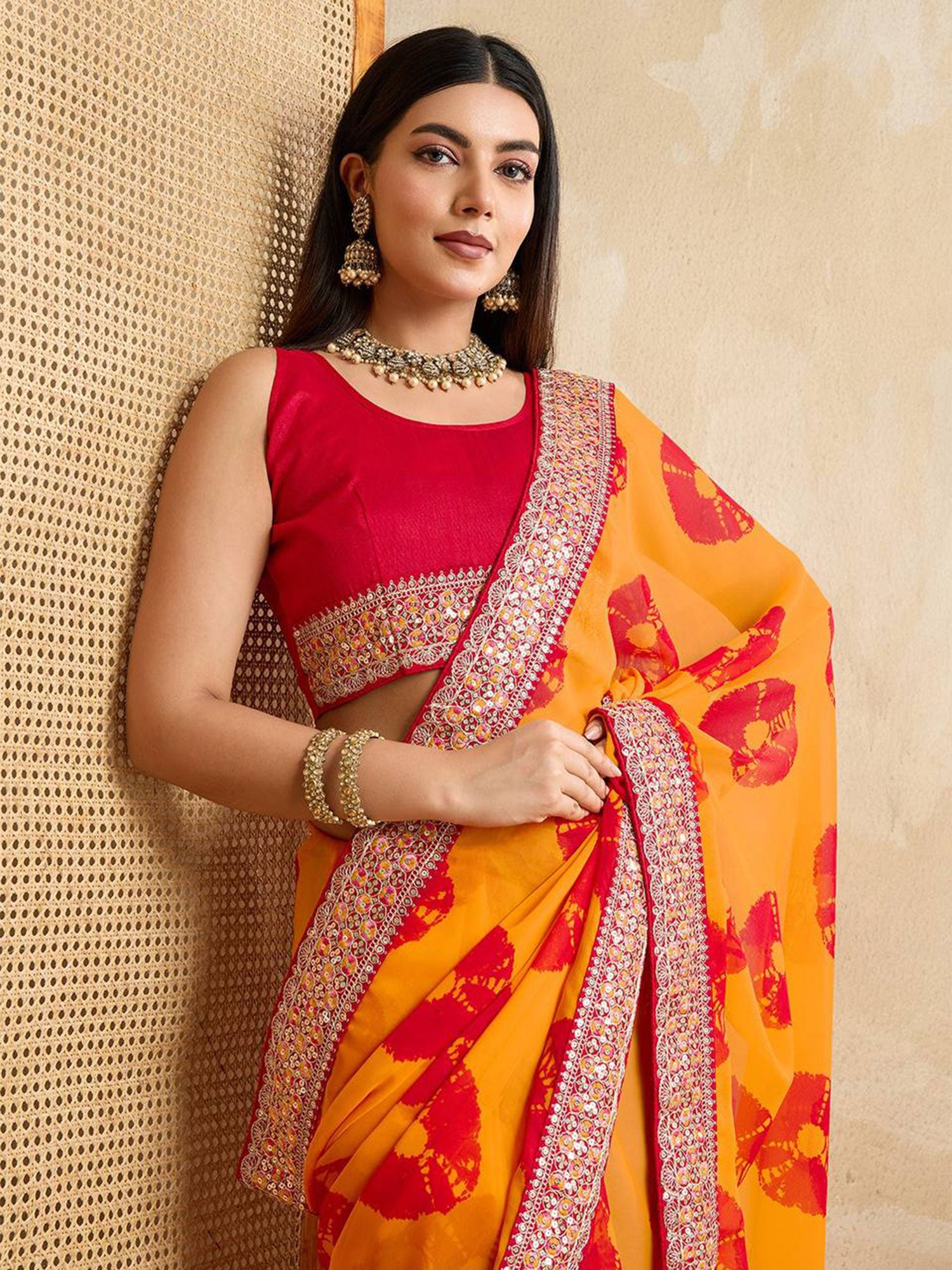 Yellow Georgette Saree With Sequins Work Border