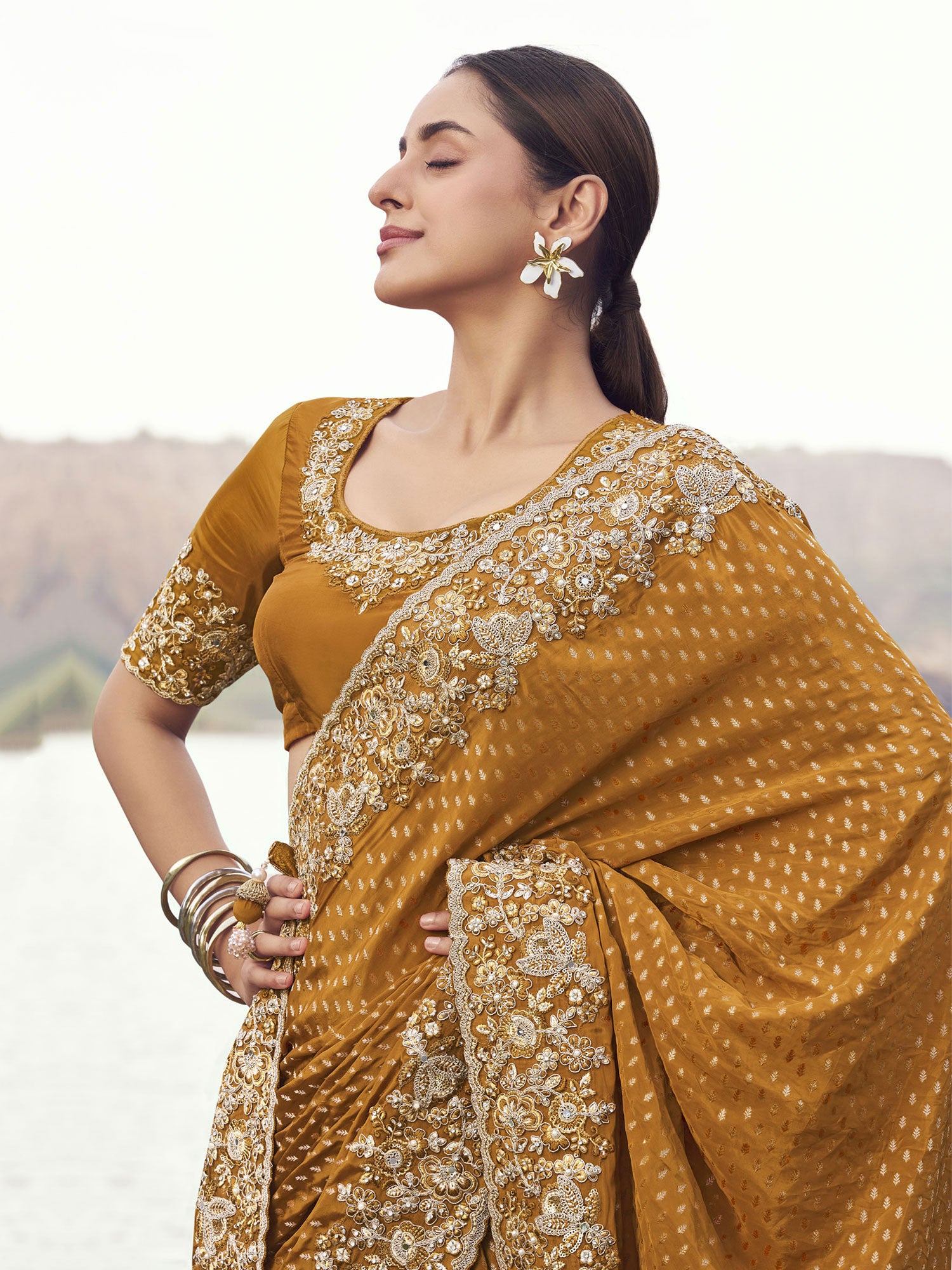 Yellow Stone Work Wedding Saree In Satin Silk