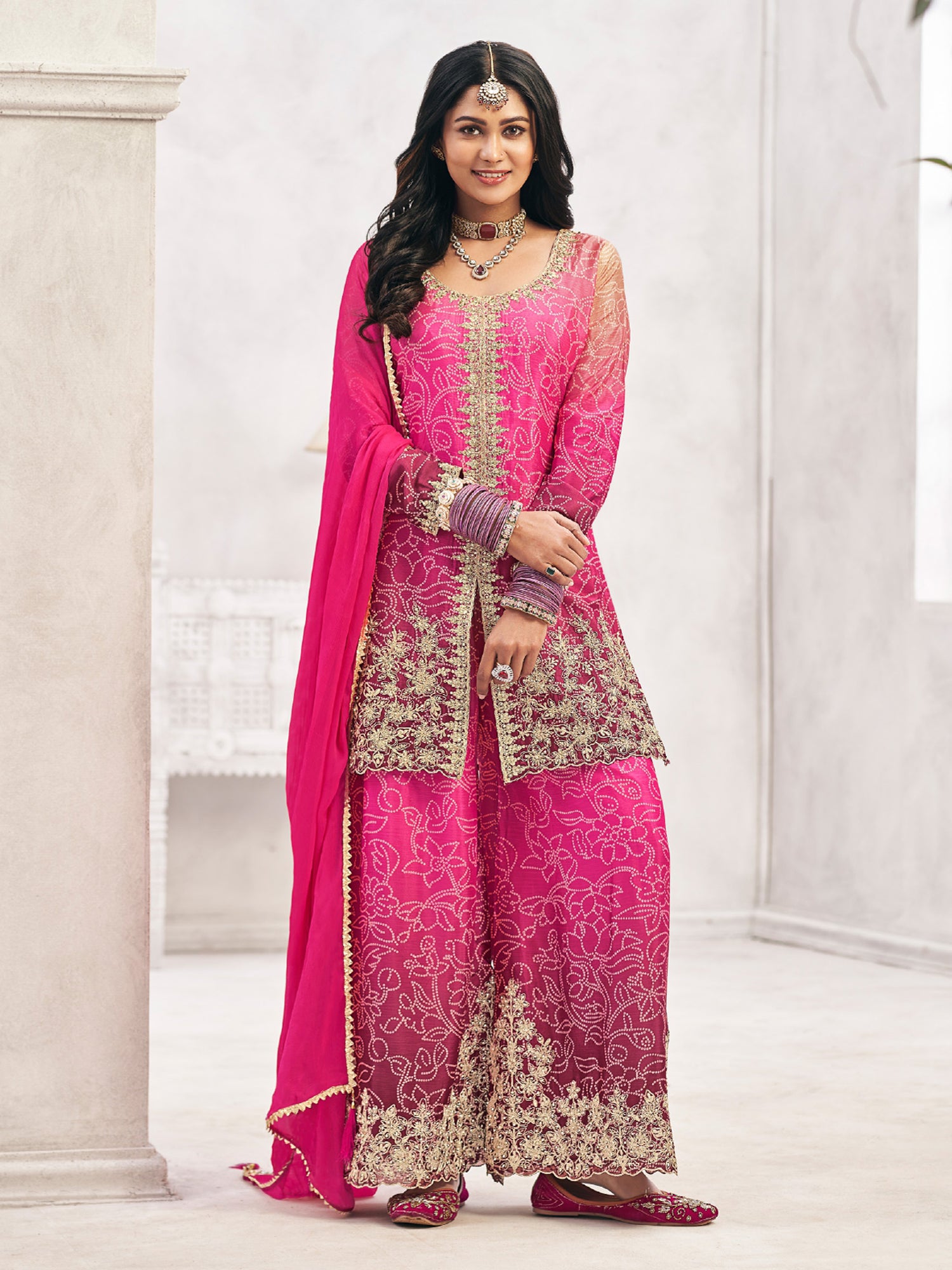 Pink And Purple Palazzo Style Suit In Bandhej Print