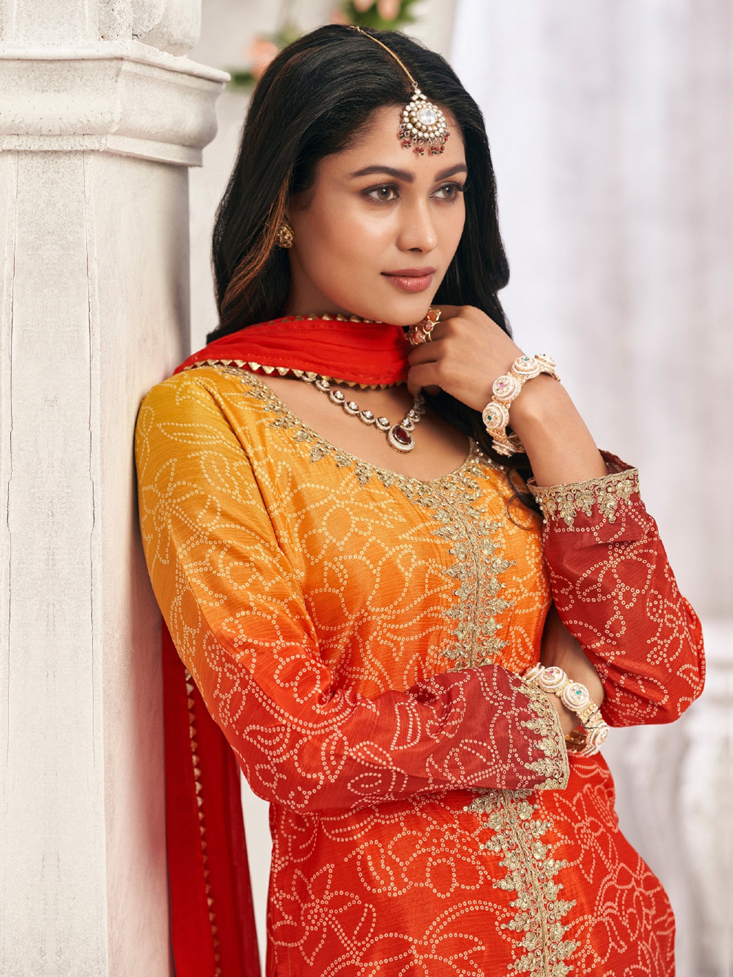 Orange And Red Shaded Salwar Kameez In Print