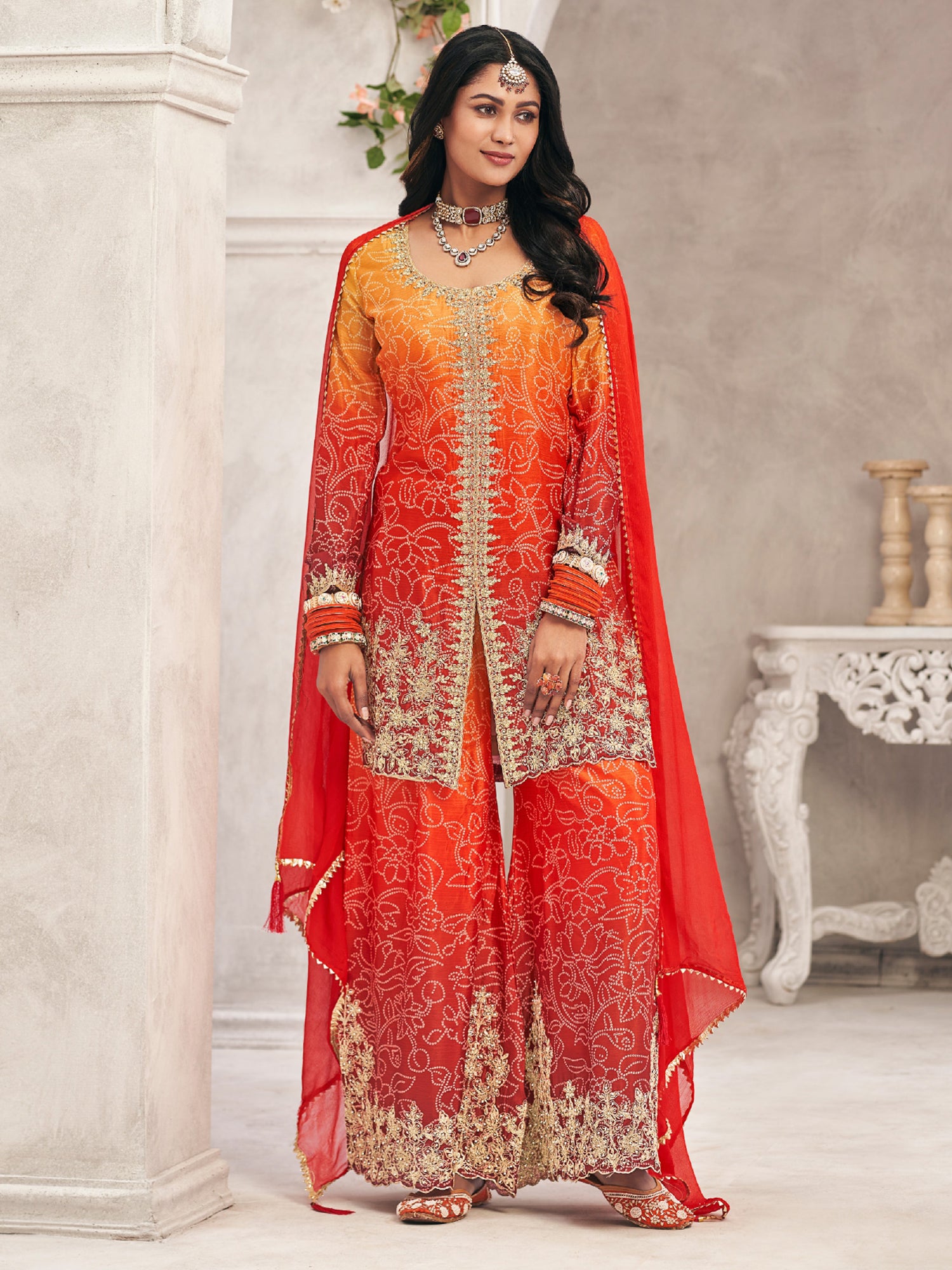 Orange And Red Shaded Salwar Kameez In Print