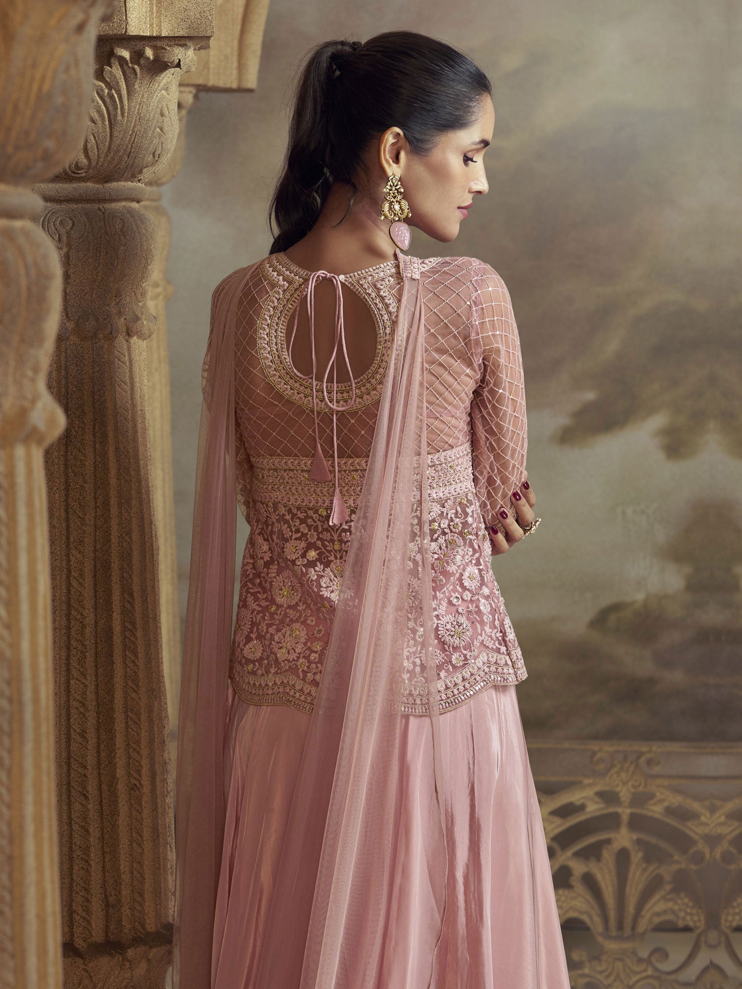 Pink Net Salwar Suit With Flare Style Kameez