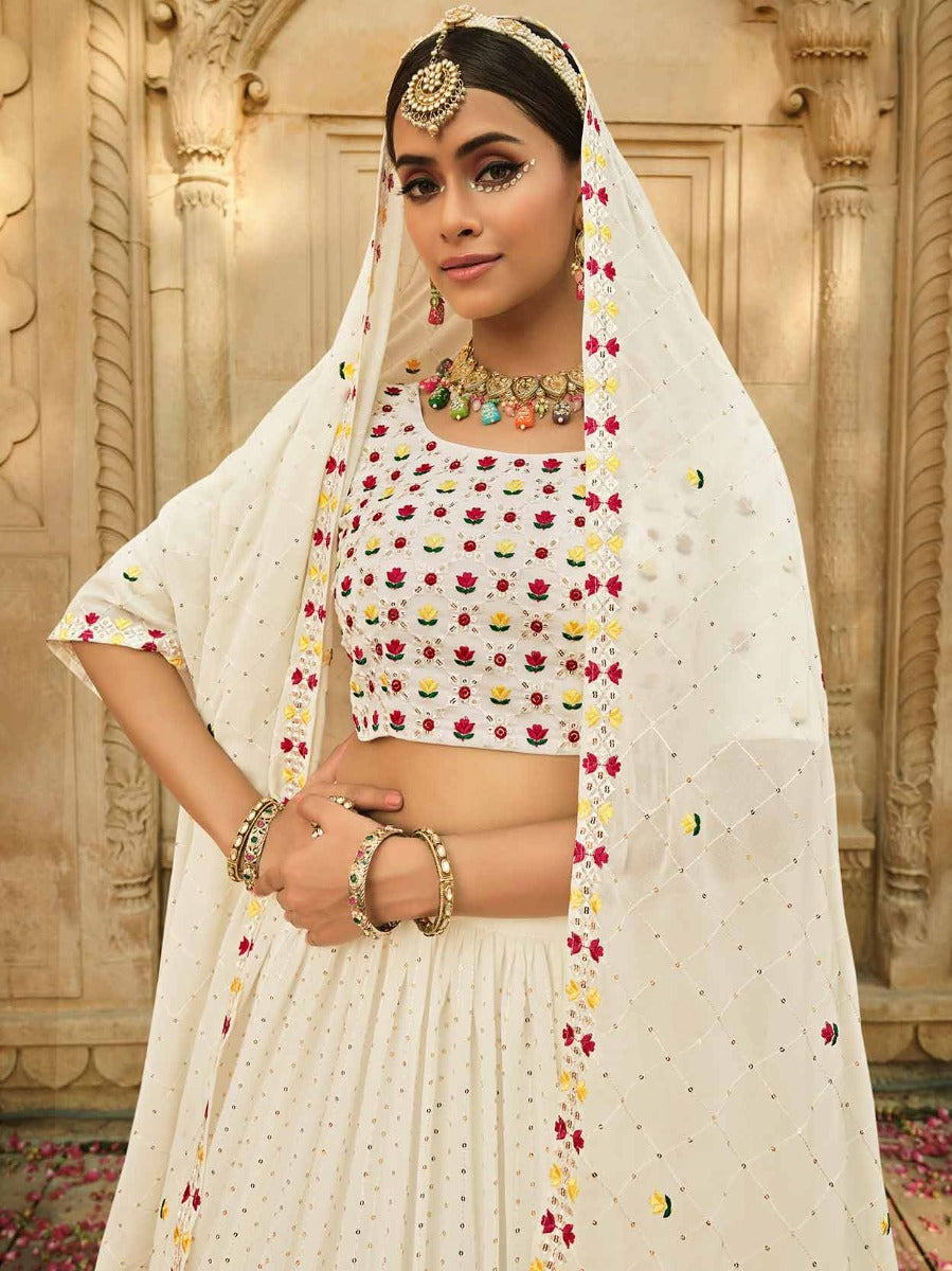 White Embroidered Lehenga Choli In Georgette