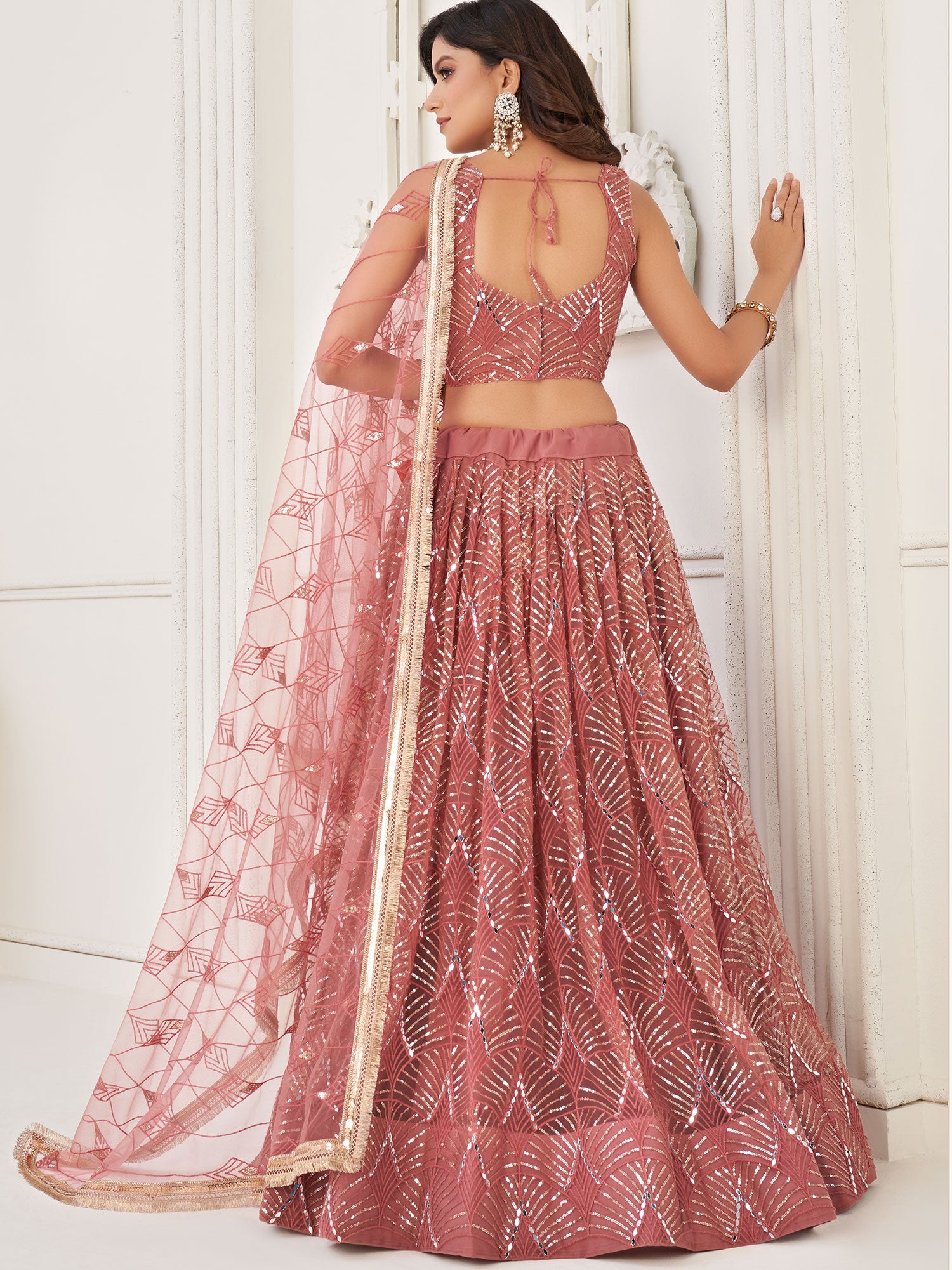 Peach Sequined Festive Lengha Choli In Net