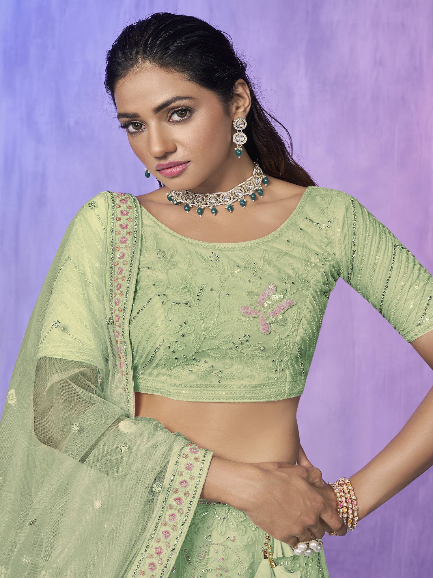 Olive Green Stone Embroidered Net Lehenga Choli