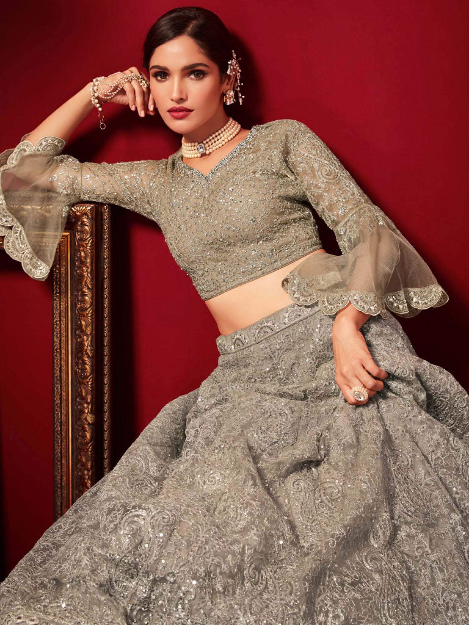 Beige Floral Stone Embroidered Lehenga Choli In Net