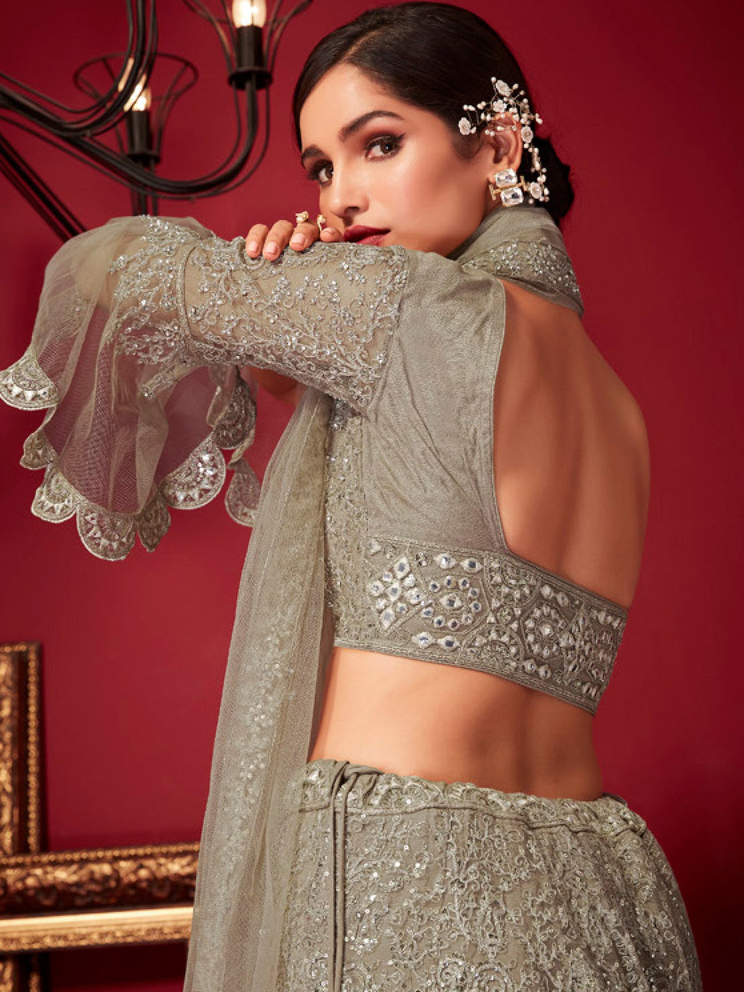 Beige Floral Stone Embroidered Lehenga Choli In Net