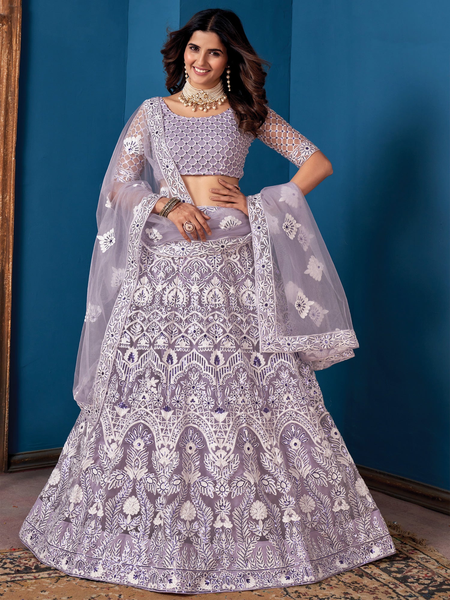 Lilac Net Lehanga Choli In Heavy Thread Embroidery