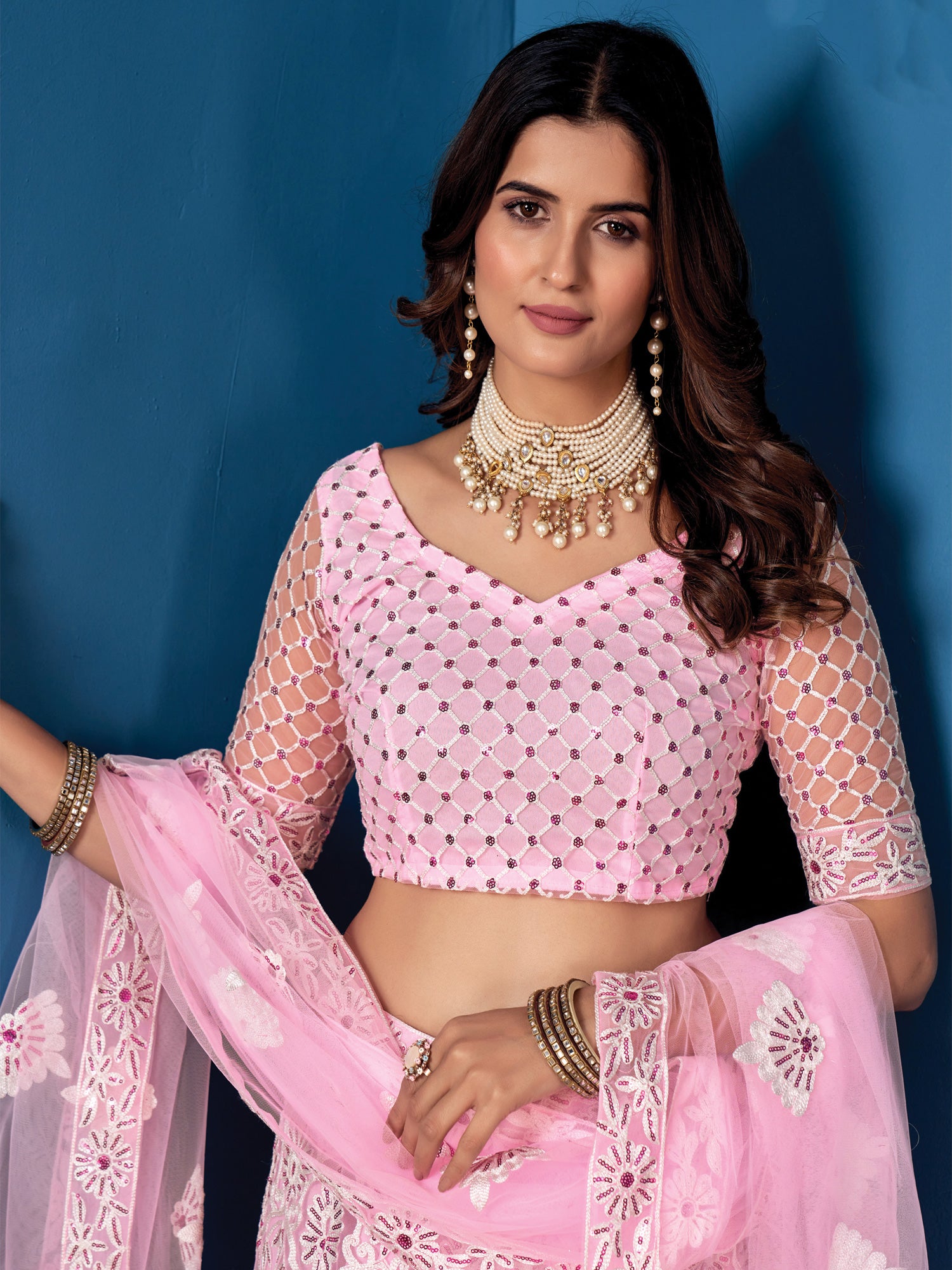 Pink Net Lehenga Choli With Dense Embroidery