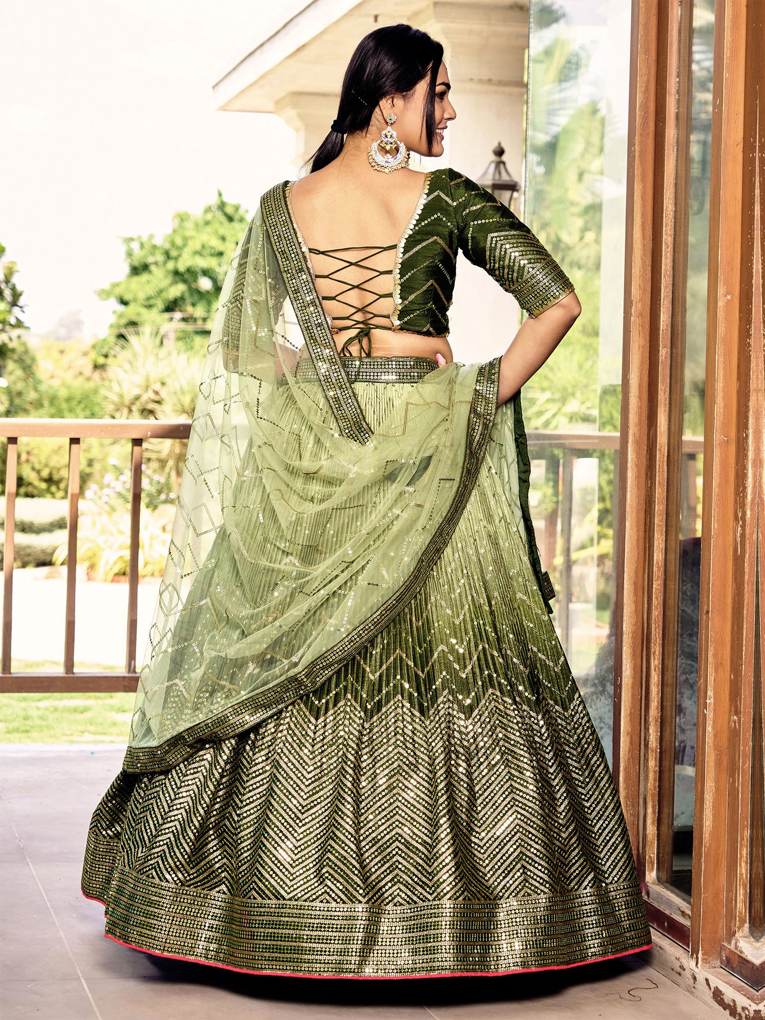 Moss Green Sequins Embellished Lehenga Choli In Chinon Silk