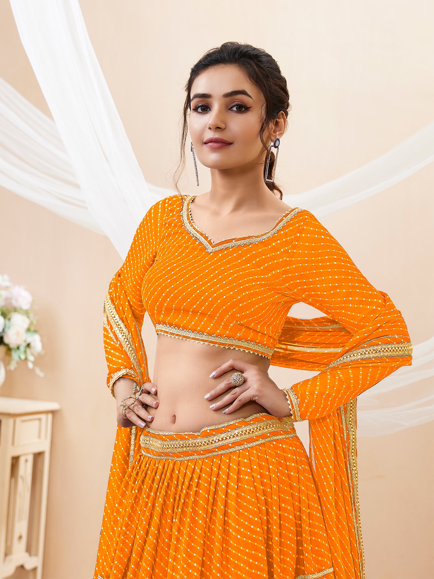 Yellow Georgette Lehenga Choli In Traditional Lehariya Print