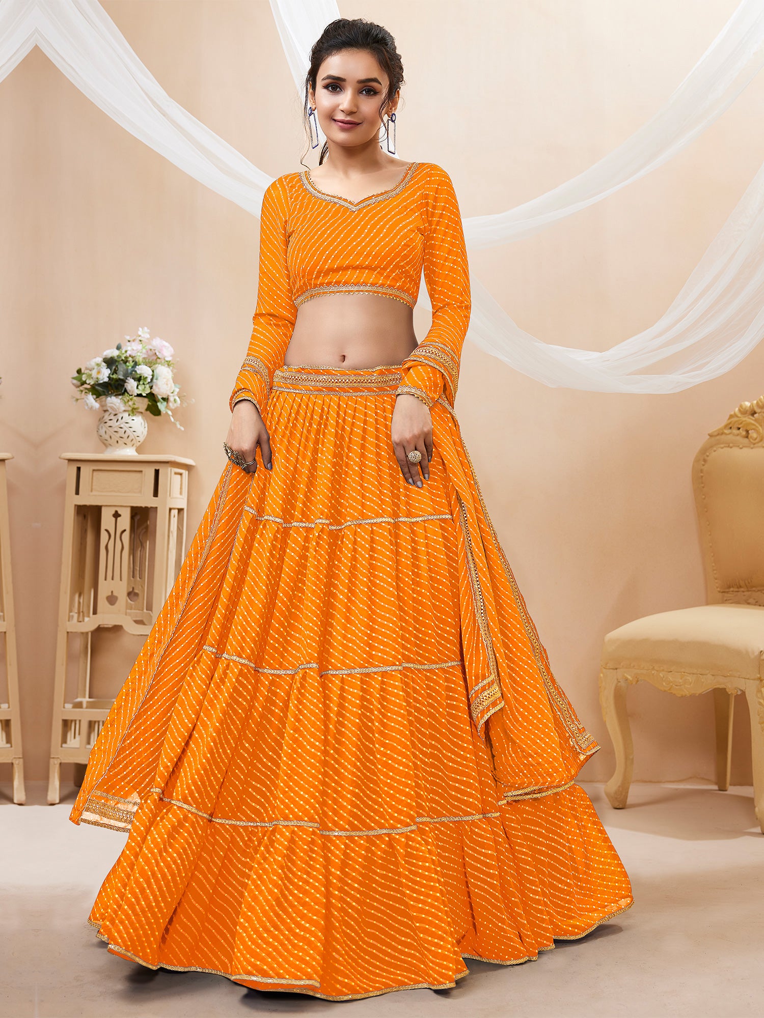 Yellow Georgette Lehenga Choli In Traditional Lehariya Print