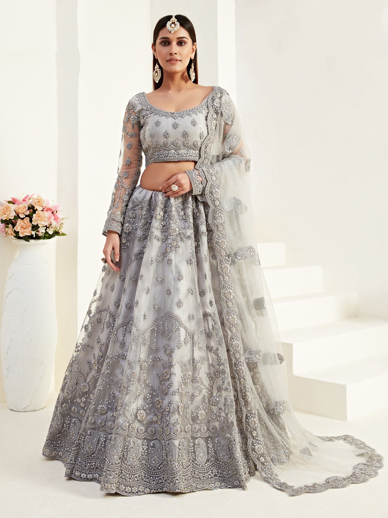 Grey Heavy Stone Embroidered Lehenga Choli In Net
