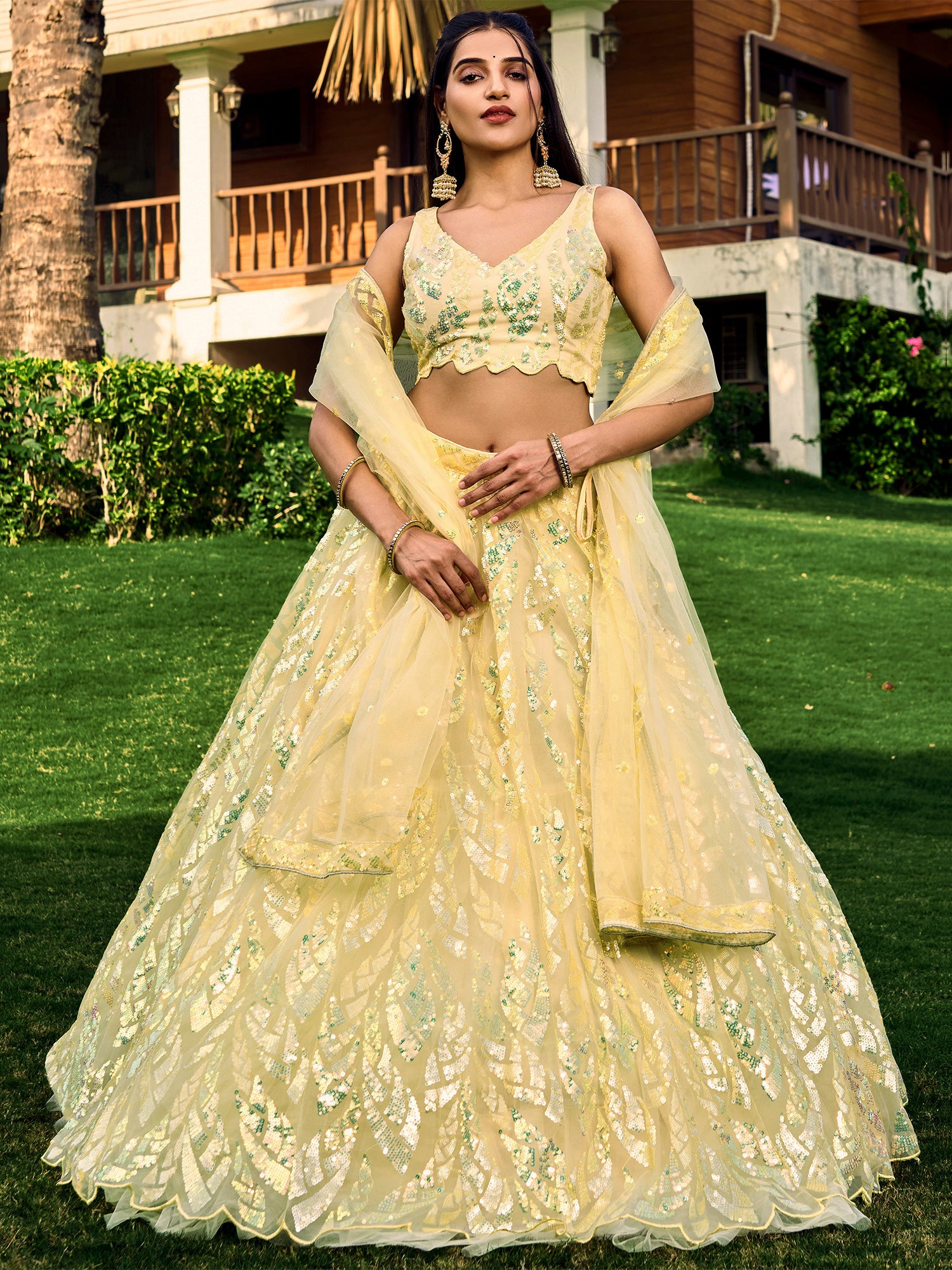 Corn Yellow Net Lehenga Choli In Sequins Embroidery