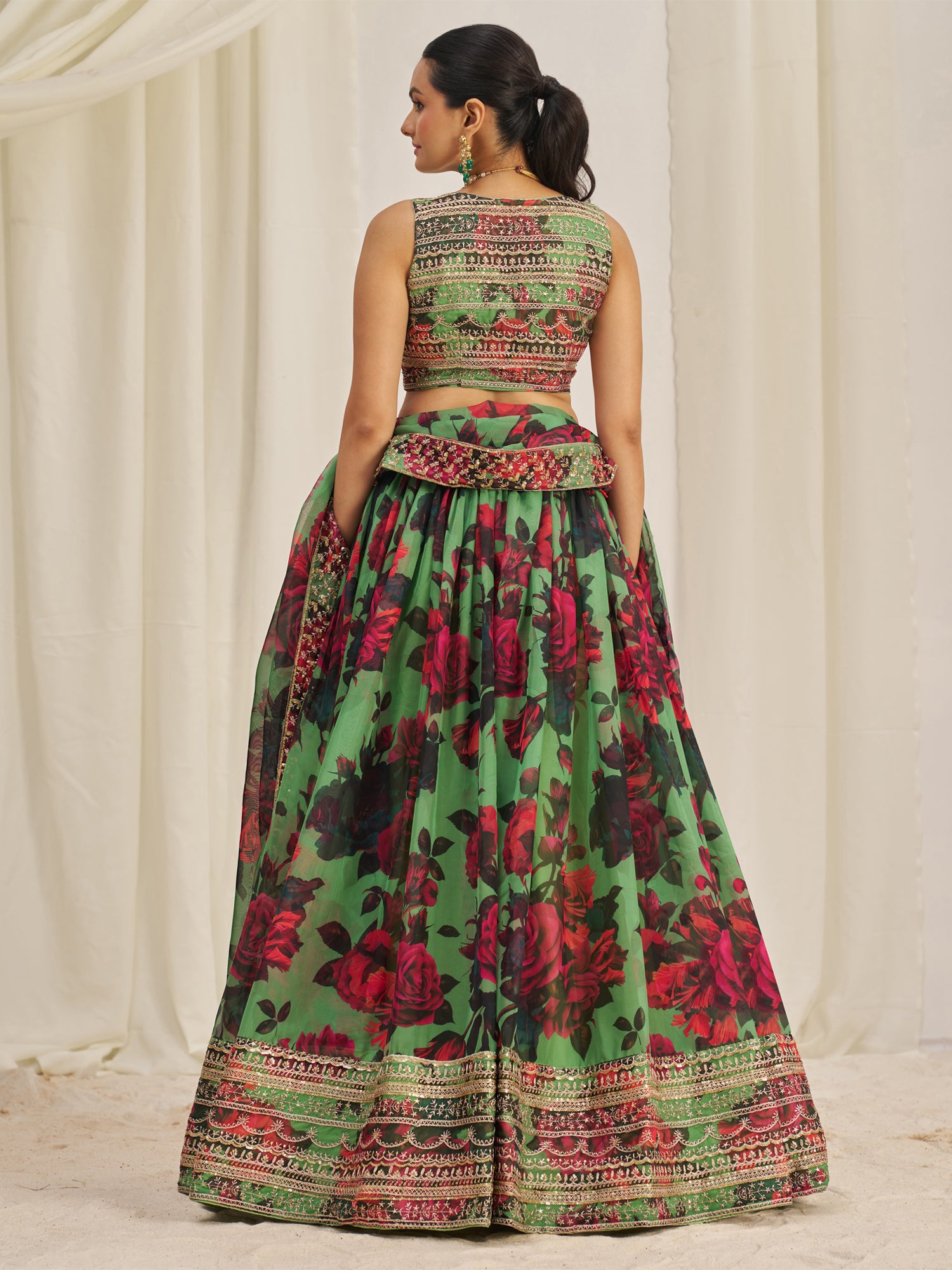 Green Sequins Enhanced Lehenga Choli In Organza