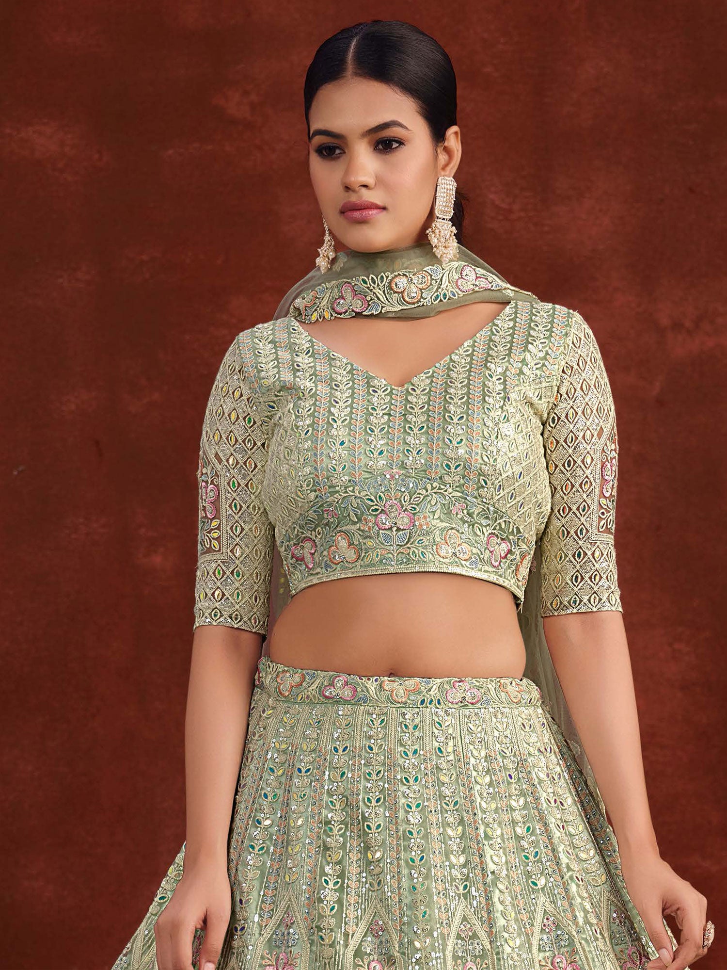 Green Wedding Wear Net Lehenga Choli In Thread Work