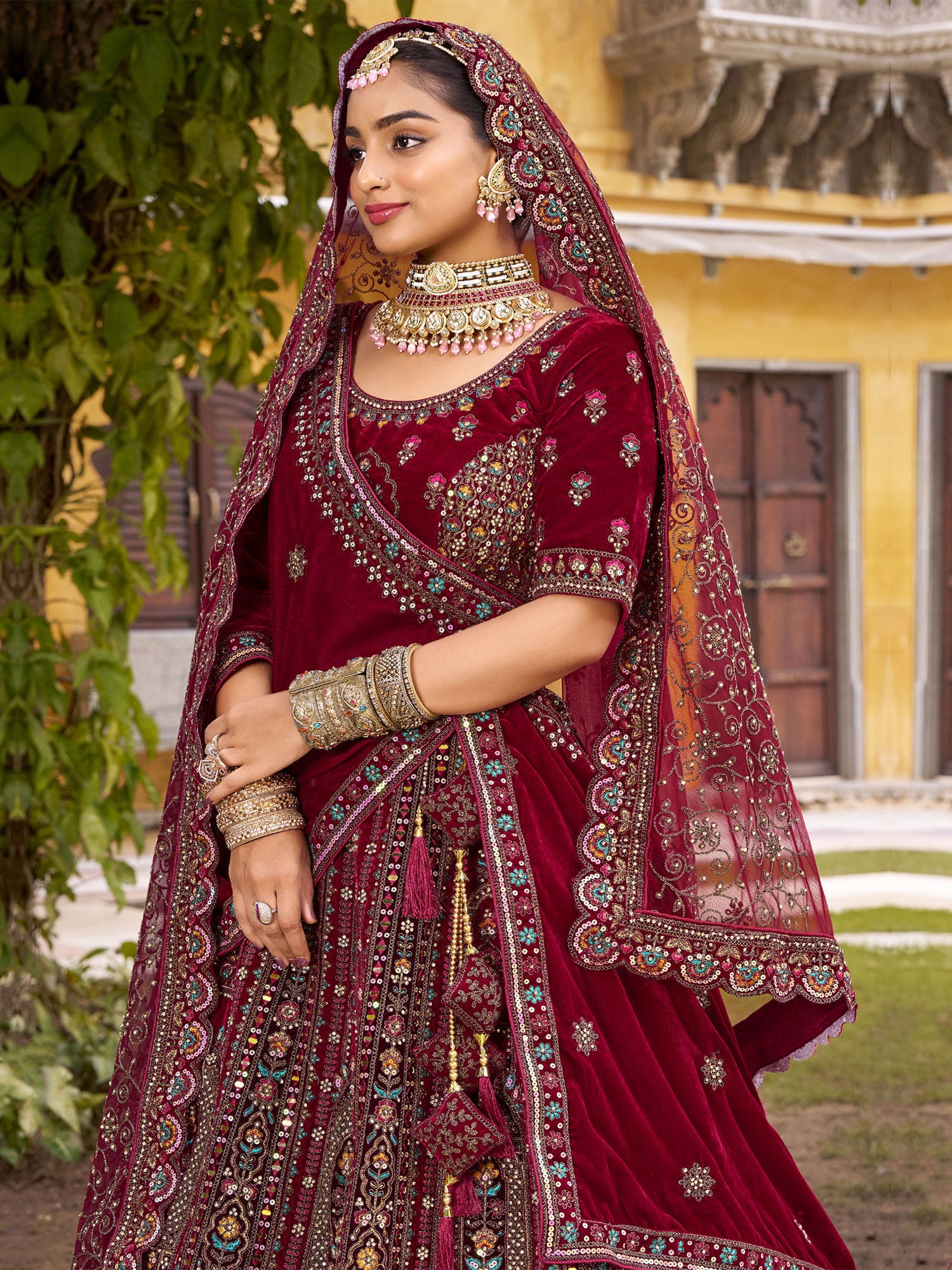 Maroon Velvet Lehenga Choli In Mirror Embellishments