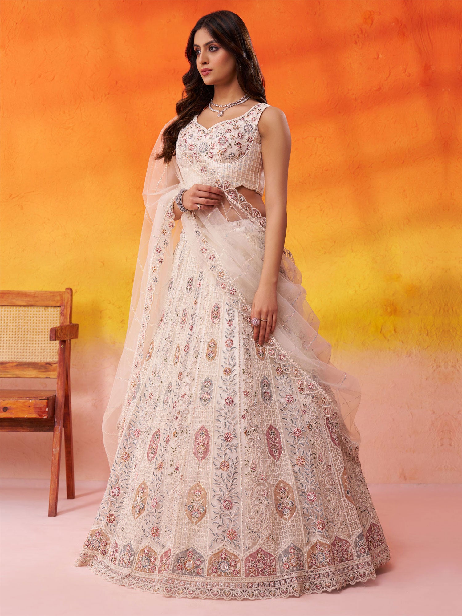 White Embroidered Party Lehenga Set In Net