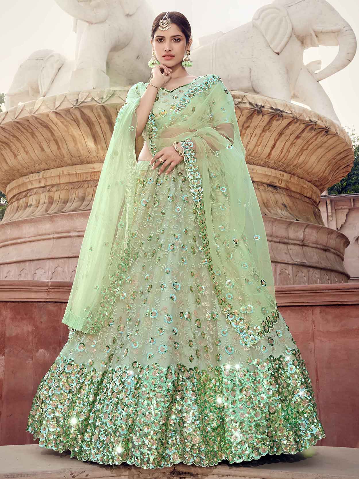 Pista Green Colour Net Wedding Lehenga.