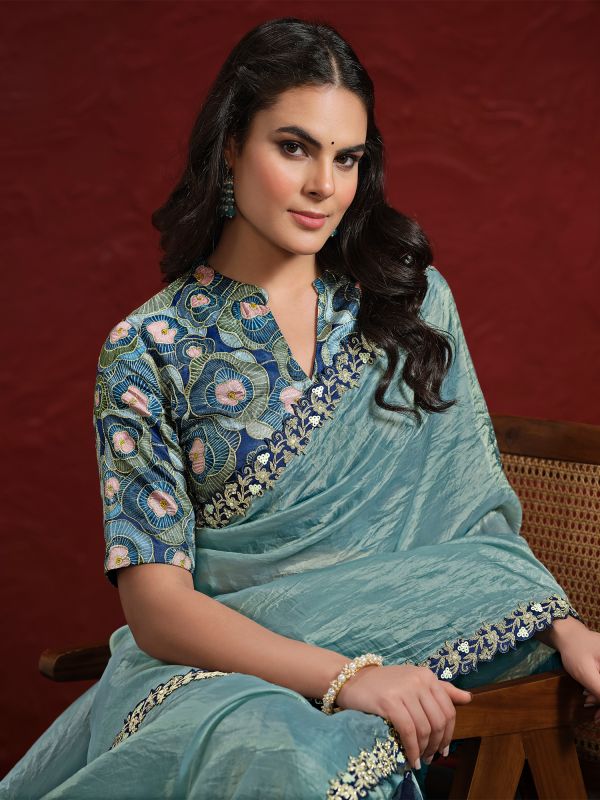 Light Blue Floral Lace Enhanced Saree In Silk