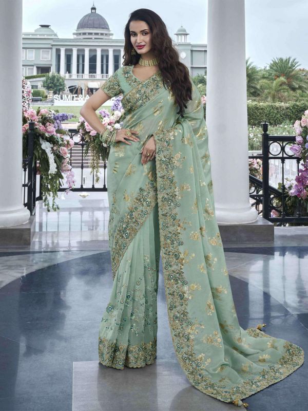 Pista Green Silk Saree In Floral Embroidered Border