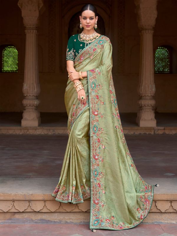 Green Silk Saree With Embroidered Borders