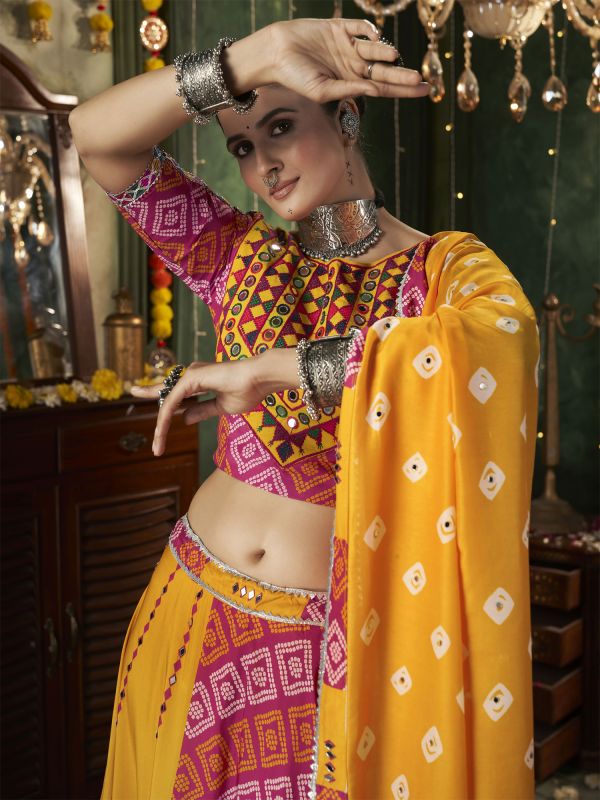 Yellow And Pink Mirror Work Lehenga Choli For Navrati