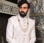 White Silk Groom Sherwani With Mirror Work