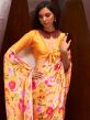 Yellow Party Wear Saree With Floral Prints