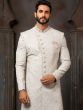 White Embroidered Asymmetric Sherwani Set In Art Silk