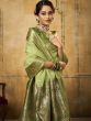 Green Zari Woven Party Wear Saree In Tissue