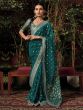 Green Party Wear Silk Saree In Floral Weaving