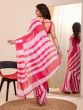 Pink And White Linear Printed Party Wear Saree In Georgette